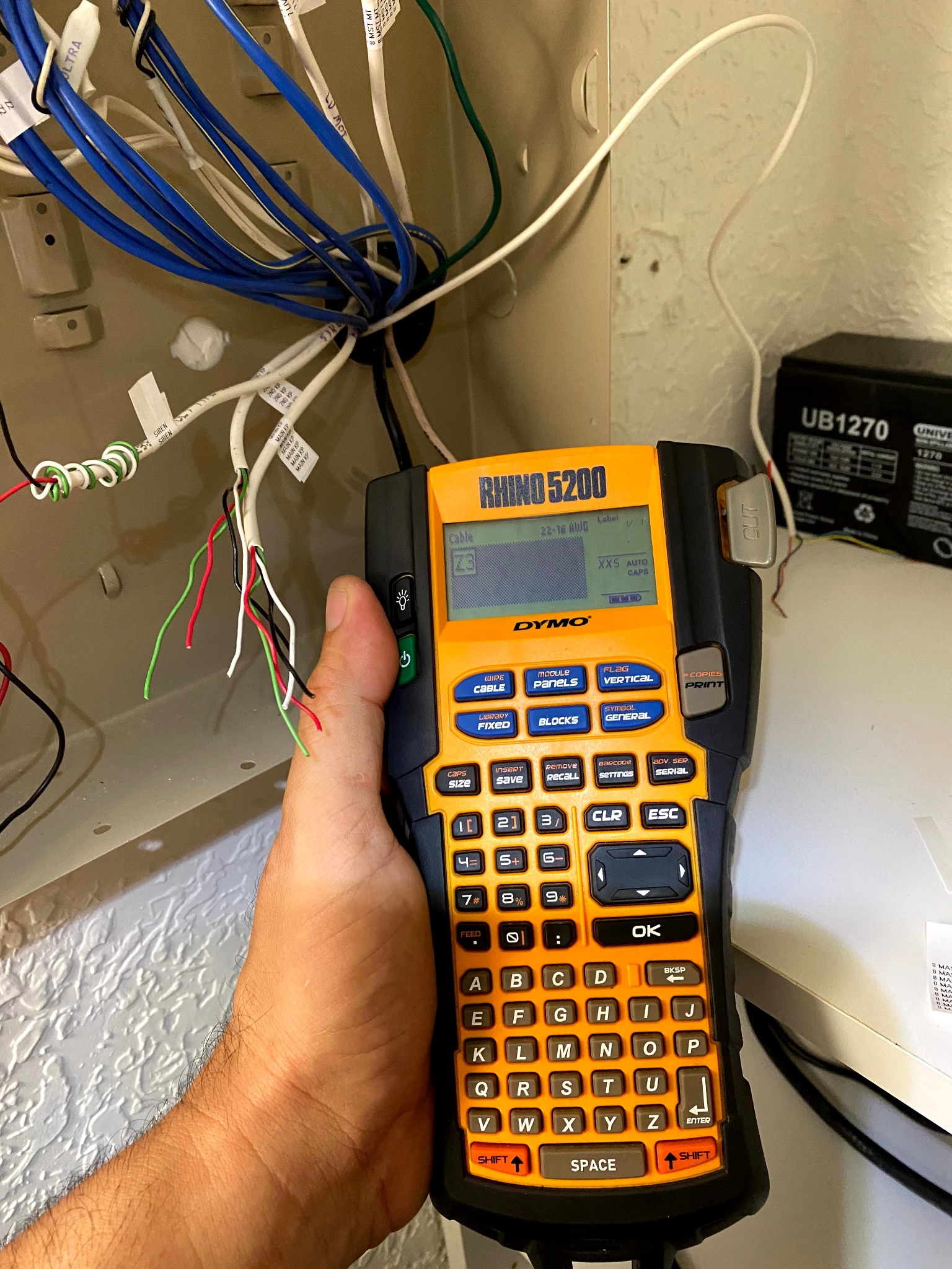 Cable labeling work using a DYMO Rhino label maker